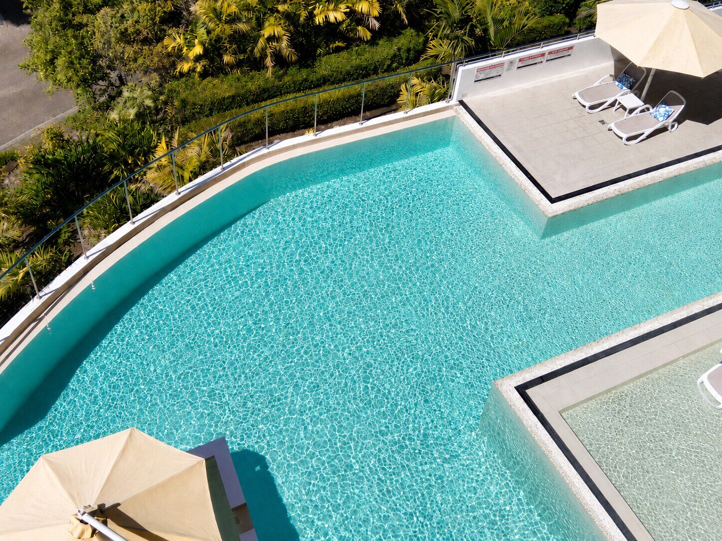 Aerial view of a sparkling resort pool