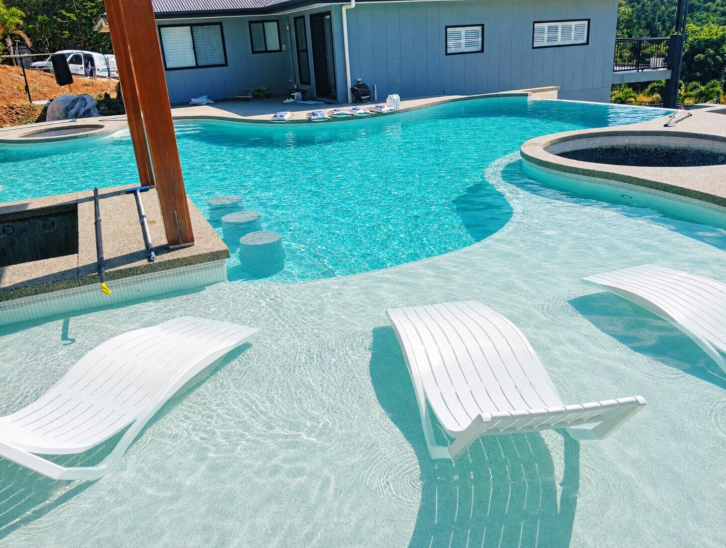 Resort pool with in-water loungers